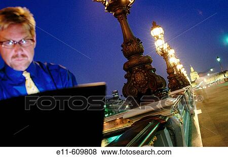 Businessman with laptop. Paris. France View Large Photo Image Stock Photo - Businessman with laptop. Paris. France. Fotosearch