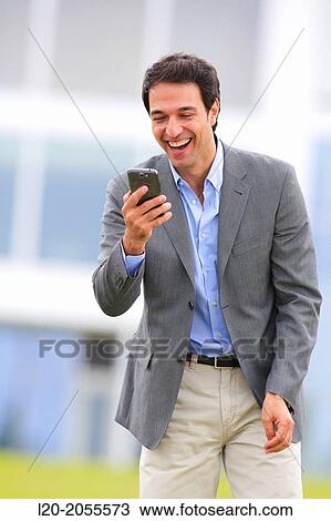 Businessman with smartphone business center. San Sebastian Technology Park. Donostia. Gipuzkoa. Basque Country. Spain. View Large Photo Image Stock Image - Businessman with smartphone business center. San Sebastian Technology Park. Donostia. Gipuzkoa. Basque Country. Spain.. Fotosearch