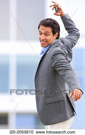 Businessman with smartphone business center. San Sebastian Technology Park. Donostia. Gipuzkoa. Basque Country. Spain. View Large Photo Image Stock Image - Businessman with smartphone business center. San Sebastian Technology Park. Donostia. Gipuzkoa. Basque Country. Spain.. Fotosearch