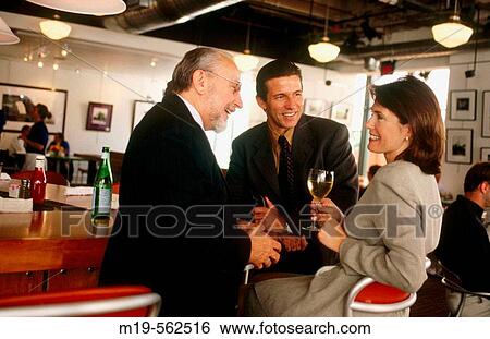 businessmen at a bar View Large Photo Image Stock Photograph - businessmen at a bar. Fotosearch