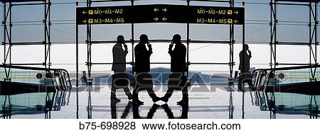 Businessmen at El Prat airport, Barcelona. Catalonia, Spain View Large Photo Image Stock Photo - Businessmen at El Prat airport, Barcelona. Catalonia, Spain. Fotosearch