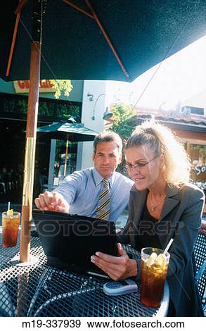 Businessmen at outdoor caf? View Large Photo Image Stock Photo - Businessmen at outdoor caf?. Fotosearch