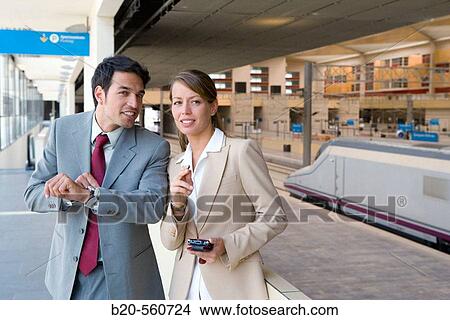 Businessmen. AVE, Tren Alta Velocidad. Delicias station, Zaragoza, Arag? n. Spain. View Large Photo Image Picture - Businessmen. AVE, Tren Alta Velocidad. Delicias station, Zaragoza, Arag? n. Spain.. Fotosearch