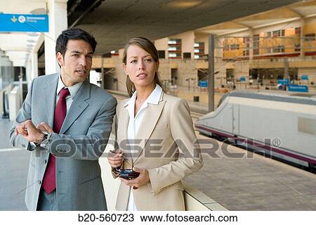 Businessmen. AVE, Tren Alta Velocidad. Delicias station, Zaragoza, Arag? n. Spain. View Large Photo Image Stock Image - Businessmen. AVE, Tren Alta Velocidad. Delicias station, Zaragoza, Arag? n. Spain.. Fotosearch
