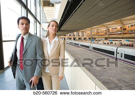 Businessmen. AVE, Tren Alta Velocidad. Delicias station, Zaragoza, Arag? n. Spain. View Large Photo Image Stock Photograph - Businessmen. AVE, Tren Alta Velocidad. Delicias station, Zaragoza, Arag? n. Spain.. Fotosearch