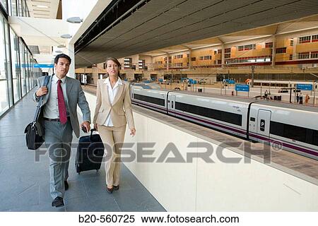 Businessmen. AVE, Tren Alta Velocidad. Delicias station, Zaragoza, Arag? n. Spain. View Large Photo Image Stock Photography - Businessmen. AVE, Tren Alta Velocidad. Delicias station, Zaragoza, Arag? n. Spain.. Fotosearch