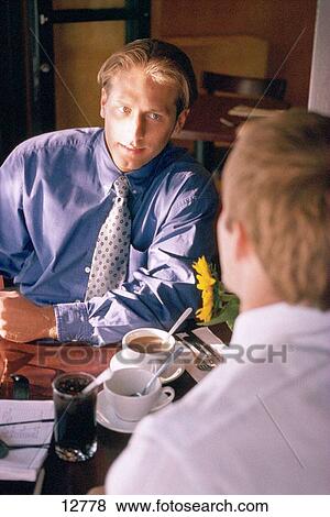 Businessmen in cafe View Large Photo Image Stock Photo - Businessmen in cafe. Fotosearch