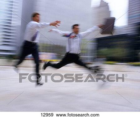 Businessmen in motion View Large Photo Image Stock Photo - Businessmen in motion. Fotosearch