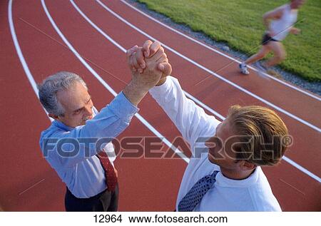Picture - Businessmen on track. Fotosearch