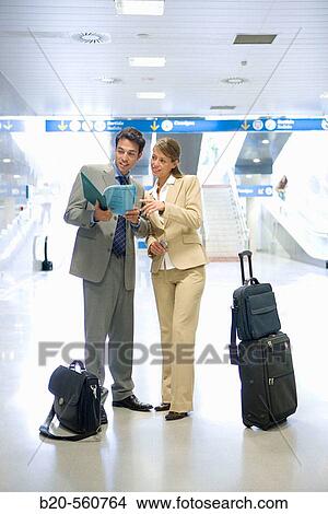 Businessmen. Passengers. Train station. Lleida, Catalua. Spain. View Large Photo Image Picture - Businessmen. Passengers. Train station. Lleida, Catalua. Spain.. Fotosearch
