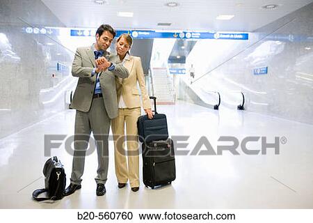 Businessmen. Passengers. Train station. Lleida, Catalua. Spain. View Large Photo Image Stock Image - Businessmen. Passengers. Train station. Lleida, Catalua. Spain.. Fotosearch
