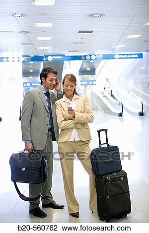 Businessmen. Passengers. Train station. Lleida, Catalua. Spain. View Large Photo Image Stock Image - Businessmen. Passengers. Train station. Lleida, Catalua. Spain.. Fotosearch