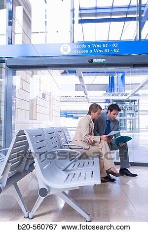 Businessmen. Passengers. Train station. Lleida, Catalua. Spain. View Large Photo Image Stock Photo - Businessmen. Passengers. Train station. Lleida, Catalua. Spain.. Fotosearch