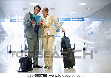 Businessmen. Passengers. Train station. Lleida, Catalua. Spain. View Large Photo Image Stock Photography - Businessmen. Passengers. Train station. Lleida, Catalua. Spain.. Fotosearch