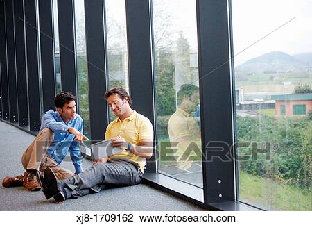 Stock Image - Businessmen. Fotosearch