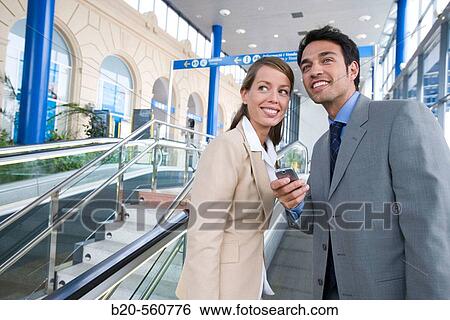 Stock Photograph - Businessmen. Train station. Lleida, Catalua. Spain.. Fotosearch