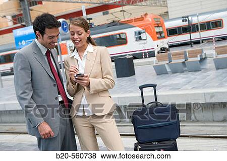 Businessmen. Travelers. Delicias station, Zaragoza, Arag? n. Spain. View Large Photo Image Stock Photo - Businessmen. Travelers. Delicias station, Zaragoza, Arag? n. Spain.. Fotosearch