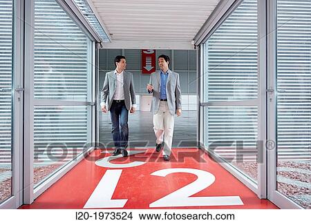 Businessmen walking, Convention Centre, Business, Donostia, San Sebastian, Basque Country, Spain. View Large Photo Image Picture - Businessmen walking, Convention Centre, Business, Donostia, San Sebastian, Basque Country, Spain.. Fotosearch