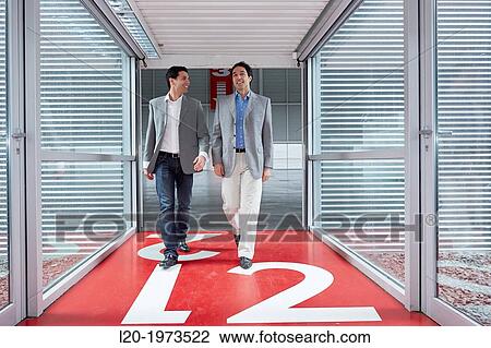 Businessmen walking, Convention Centre, Business, Donostia, San Sebastian, Basque Country, Spain. View Large Photo Image Stock Image - Businessmen walking, Convention Centre, Business, Donostia, San Sebastian, Basque Country, Spain.. Fotosearch