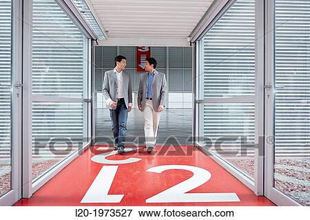 Businessmen walking, Convention Centre, Business, Donostia, San Sebastian, Basque Country, Spain. View Large Photo Image Stock Photo - Businessmen walking, Convention Centre, Business, Donostia, San Sebastian, Basque Country, Spain.. Fotosearch