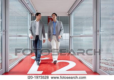 Businessmen walking, Convention Centre, Business, Donostia, San Sebastian, Basque Country, Spain. View Large Photo Image Stock Photo - Businessmen walking, Convention Centre, Business, Donostia, San Sebastian, Basque Country, Spain.. Fotosearch