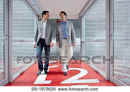 Businessmen walking, Convention Centre, Business, Donostia, San Sebastian, Basque Country, Spain. View Large Photo Image Stock Photo - Businessmen walking, Convention Centre, Business, Donostia, San Sebastian, Basque Country, Spain.. Fotosearch