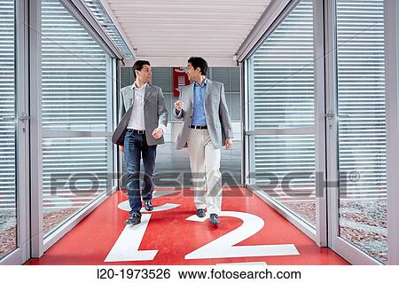 Businessmen walking, Convention Centre, Business, Donostia, San Sebastian, Basque Country, Spain. View Large Photo Image Stock Photograph - Businessmen walking, Convention Centre, Business, Donostia, San Sebastian, Basque Country, Spain.. Fotosearch