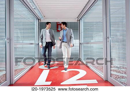 Businessmen walking, Convention Centre, Business, Donostia, San Sebastian, Basque Country, Spain. View Large Photo Image Stock Photography - Businessmen walking, Convention Centre, Business, Donostia, San Sebastian, Basque Country, Spain.. Fotosearch
