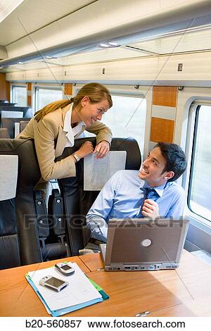 Businessmen working connected to the internet. Passenger. AVE, Tren de Alta Velocidad, Zaragoza, Arag? n. Spain. View Large Photo Image Stock Photo - Businessmen working connected to the internet. Passenger. AVE, Tren de Alta Velocidad, Zaragoza, Arag? n. Spain.. Fotosearch