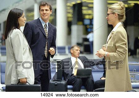 Businesspeople at the airport View Large Photo Image Picture - Businesspeople at the airport. Fotosearch