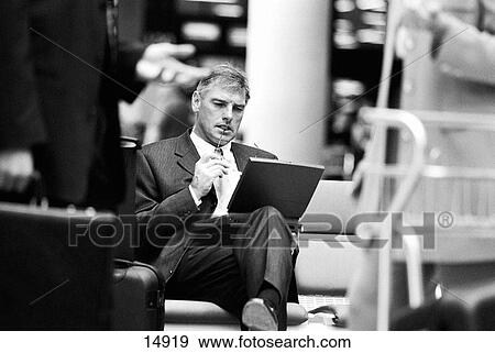 Businesspeople at the airport View Large Photo Image Stock Photo - Businesspeople at the airport. Fotosearch