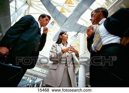 Businesspeople at the airport View Large Photo Image Stock Photo - Businesspeople at the airport. Fotosearch