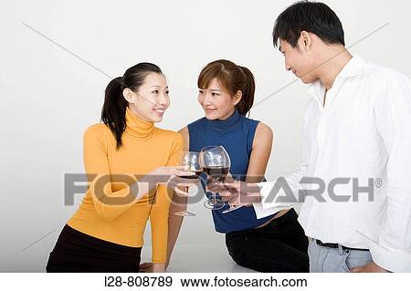 Stock Photo - Businesspeople drinking Wine. Fotosearch