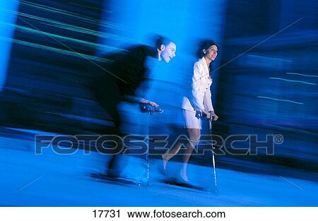 Businesspeople on scooter View Large Photo Image Stock Image - Businesspeople on scooter. Fotosearch
