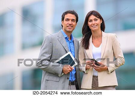 Businesswoman and businessman in business center. San Sebastian Technology Park. Donostia. Gipuzkoa. Basque Country. Spain. View Large Photo Image Picture - Businesswoman and businessman in business center. San Sebastian Technology Park. Donostia. Gipuzkoa. Basque Country. Spain.. Fotosearch