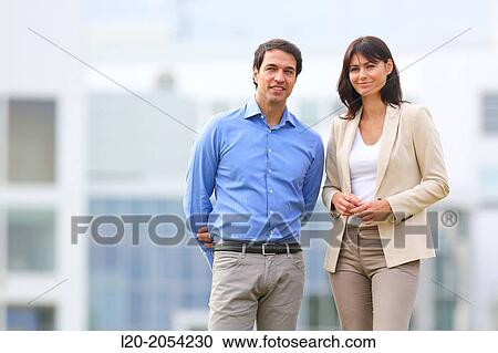 Businesswoman and businessman in business center. San Sebastian Technology Park. Donostia. Gipuzkoa. Basque Country. Spain. View Large Photo Image Stock Image - Businesswoman and businessman in business center. San Sebastian Technology Park. Donostia. Gipuzkoa. Basque Country. Spain.. Fotosearch