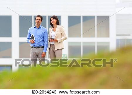 Businesswoman and businessman in business center. San Sebastian Technology Park. Donostia. Gipuzkoa. Basque Country. Spain. View Large Photo Image Stock Image - Businesswoman and businessman in business center. San Sebastian Technology Park. Donostia. Gipuzkoa. Basque Country. Spain.. Fotosearch