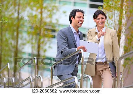 Businesswoman and businessman talking on stairs. business center. San Sebastian Technology Park. Donostia. Gipuzkoa. Basque Country. Spain. View Large Photo Image Stock Image - Businesswoman and businessman talking on stairs. business center. San Sebastian Technology Park. Donostia. Gipuzkoa. Basque Country. Spain.. Fotosearch