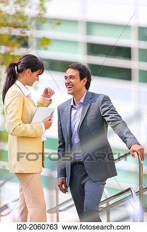 Businesswoman and businessman talking on stairs. business center. San Sebastian Technology Park. Donostia. Gipuzkoa. Basque Country. Spain. View Large Photo Image Stock Image - Businesswoman and businessman talking on stairs. business center. San Sebastian Technology Park. Donostia. Gipuzkoa. Basque Country. Spain.. Fotosearch