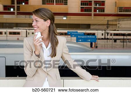 Businesswoman. AVE, Tren Alta Velocidad. Delicias station, Zaragoza, Arag? n. Spain. View Large Photo Image Stock Image - Businesswoman. AVE, Tren Alta Velocidad. Delicias station, Zaragoza, Arag? n. Spain.. Fotosearch