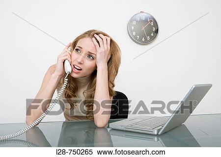 Businesswoman talking on telephone View Large Photo Image Stock Photography - Businesswoman talking on telephone. Fotosearch
