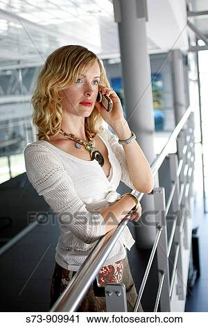 Businesswoman Using Cell Phone View Large Photo Image Stock Image - Businesswoman Using Cell Phone. Fotosearch