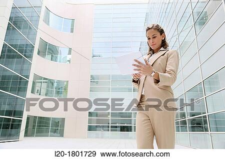 Businesswoman using digital tablet View Large Photo Image Stock Photo - Businesswoman using digital tablet. Fotosearch