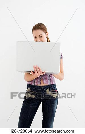 Picture - businesswoman using laptop. Fotosearch