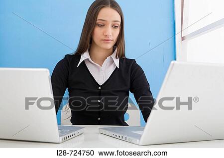 businesswoman using laptop View Large Photo Image Stock Image - businesswoman using laptop. Fotosearch