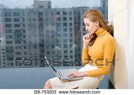 businesswoman using laptop View Large Photo Image Stock Image - businesswoman using laptop. Fotosearch