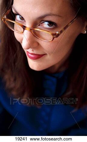 Businesswoman wearing glasses View Large Photo Image Stock Image - Businesswoman wearing glasses. Fotosearch