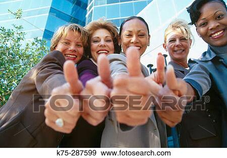 businesswomen giving the thumbs up View Large Photo Image Stock Photo - businesswomen giving the thumbs up. Fotosearch