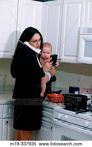 Busy mother View Large Photo Image Stock Photography - Busy mother. Fotosearch