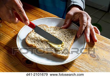 Butter spreading. View Large Photo Image Stock Photo - Butter spreading.. Fotosearch